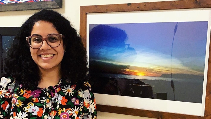 Sundes with her sunset photo work